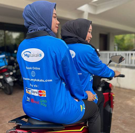 MyKakaks team members in branded blue uniforms ready to provide cleaning services